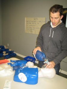 Using a bag-valve mask during First Aid and CPR Courses in Toronto